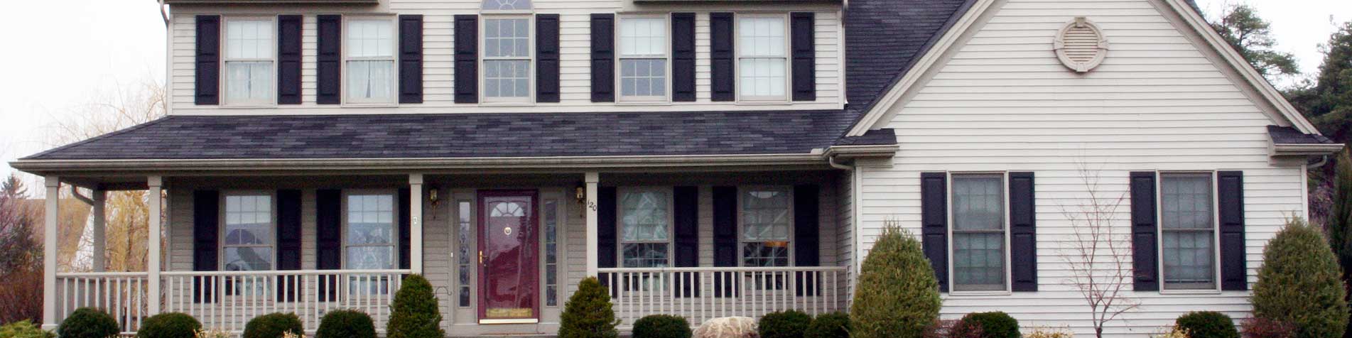 White painted house with red door