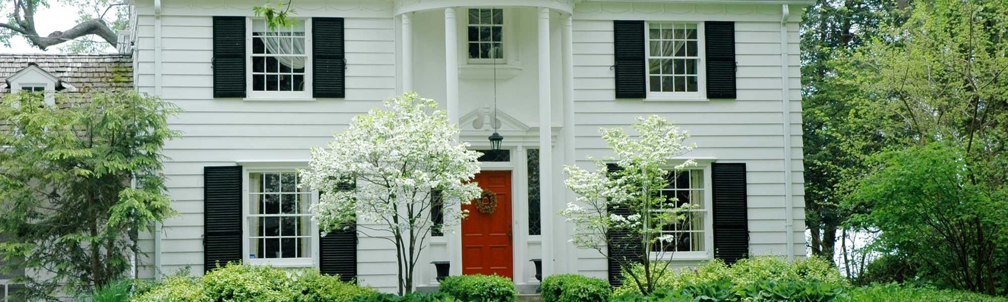 White house with red door